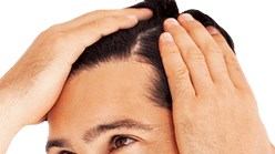 person combing through hair