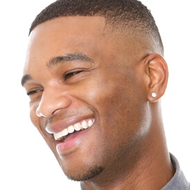 close up of man smiling