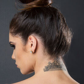 woman with tattoo on back of neck